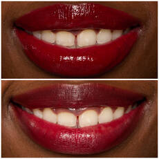Labios de modelo usando Lip I.V. 13 Cranberry Splash.